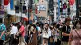Japan Q4 GDP revised up to slight expansion, economy avoids recession