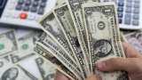 Dollar slips as Fed stays the course; Aussie jumps on jobs data