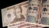 Dollar steadies, yen teeters ahead of key US inflation data