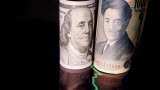 Dollar firms while yen pinned near 152