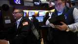 US stocks end down, crude slides amid Fed, geopolitical crosscurrents