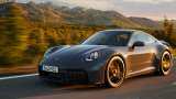 Porsche unveils first street-legal hybrid 911: Check price, features, performance