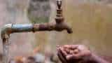 People wait in long queues as Delhi continues to grapple with water shortage