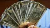 Rupee sees range-bound trade against US dollar in morning deals