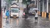 Sudden downpour leaves Delhi waterlogged, rain abates in Mumbai