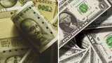 Currency Market News: Rupee trades in narrow range against dollar