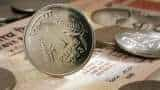 Rupee ends at record low of 84.76 vs dollar 