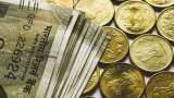 Rupee settles 3 paise higher at 87.34 against US dollar 