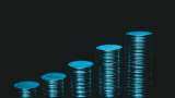 Rupee settles 10 paise higher at 87.21 against US dollar