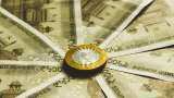 Rupee gains 2 paise to close at 87.19 against US dollar