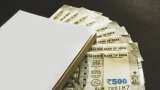 Currency Market News: Rupee hits 7-month high before retreating; closes nearly flat at 84.53 vs US dollar