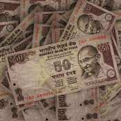 Rupee rises 2 paise to settle at 83.95 against US dollar