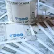 Currency Update: Rupee falls 14 paise to close at all-time low of 85.08 against US dollar