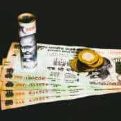 Rupee weakens by 7 paise to close at 85.11 against US dollar