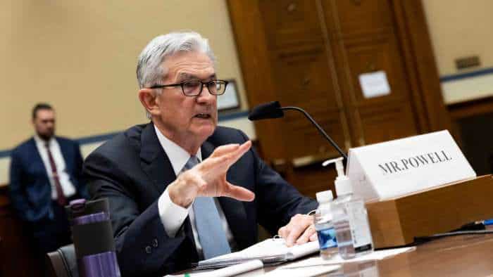 Fed signals rate hikes could come &#039;&#039;soon&#039;&#039;; stocks shed gains, Treasuries jump 