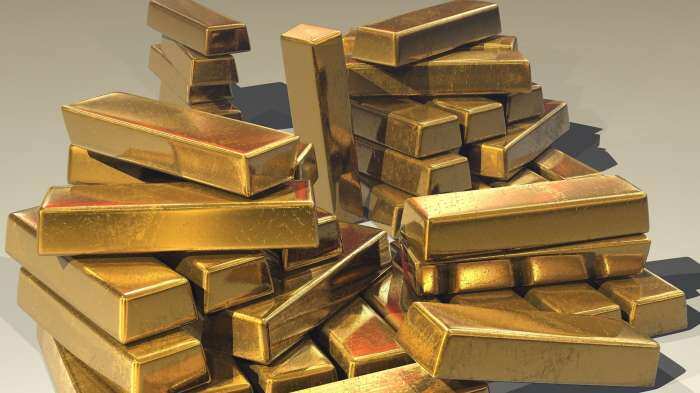 Gold price forecast: Yellow metal rate rises after Fed signals more hikes; analysts see levels as high as Rs 62,500