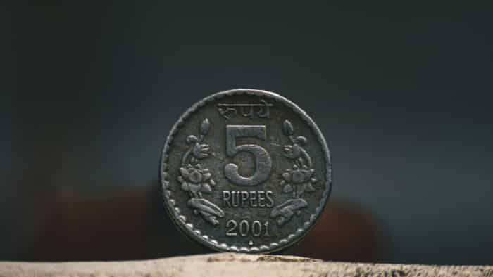  Rupee recovers from record lows; rises 6 paise to settle at 83.34 against US dollar 