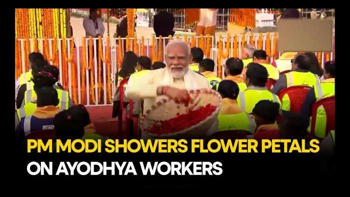 PM Modi Applauds Ayodhya Ram Mandir Builders; Showers Them With Petals