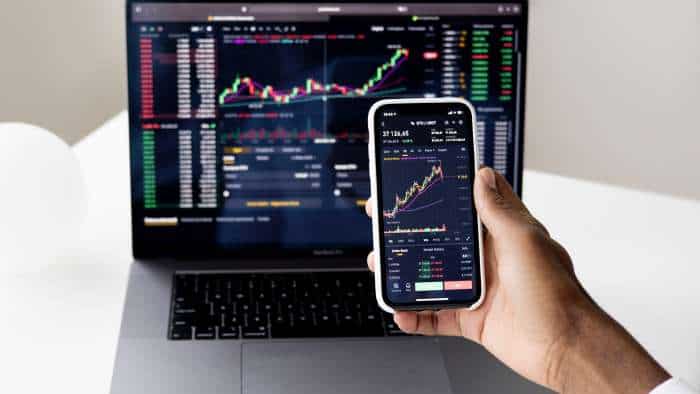 stocks to buy for long term Zee Business analysts 1 year  recommendation target price LIC Metro Brands Britannia FIEM Ashok Leyland Cummins Power Grid Indian Hotels Hindalco Dixon Tech Amber NSE BSE