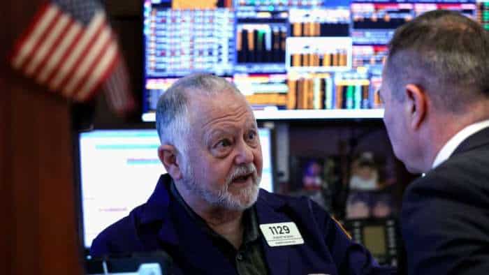 Wall Street stocks fall as markets weigh strong wage data, Fed meeting