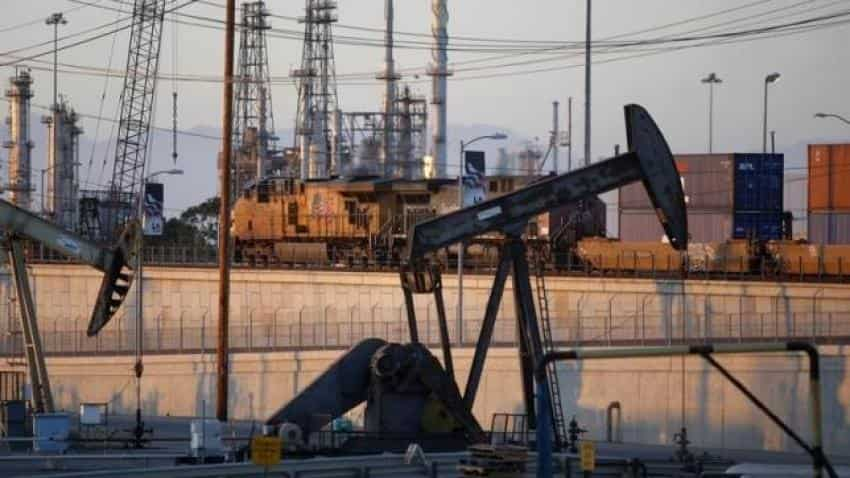 Crude oil futures rise on weaker dollar, new cash inflows 