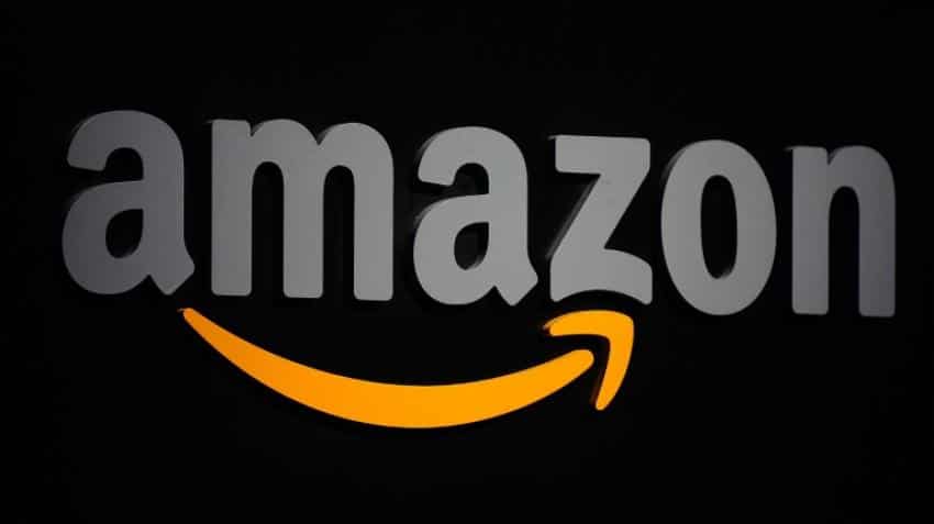 Amazon delivers profit, stock surges 12% Amazon delivers profit, stock surges 12%