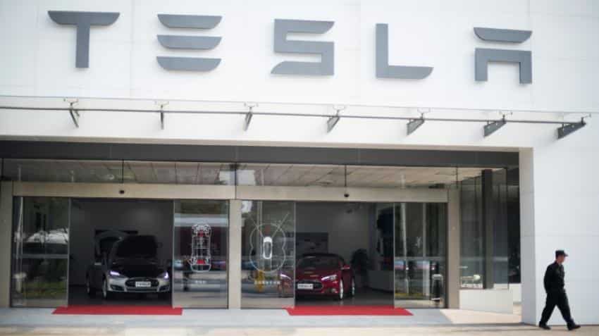Tesla accelerates to hit target of 500,000 cars yearly Tesla accelerates to hit target of 500,000 cars yearly