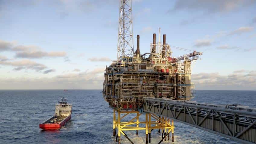 Oil prices down on brimming crude stocks, Canada fires move away from oil sands Oil prices down on brimming crude stocks, Canada fires move away from oil sands