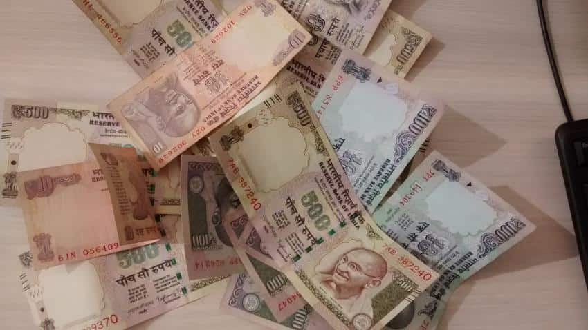 Rupee stutters, falls 4 paise against dollar