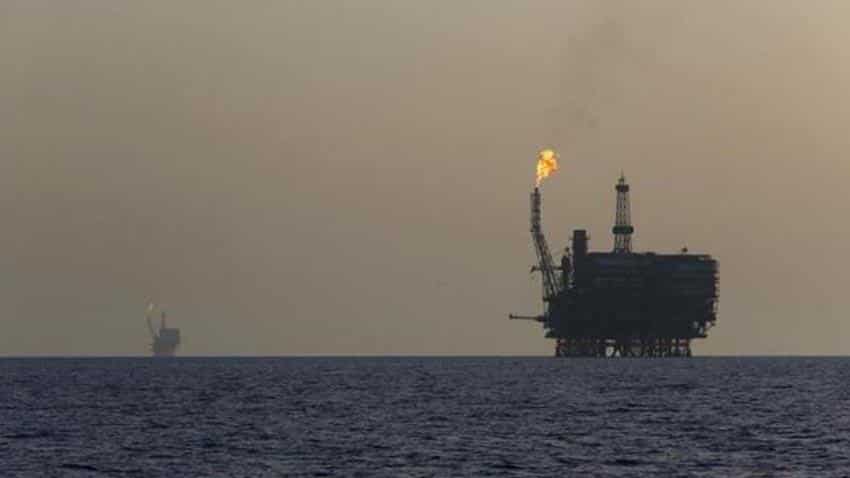 Asian oil prices slip on strong dollar, firm global supplies 