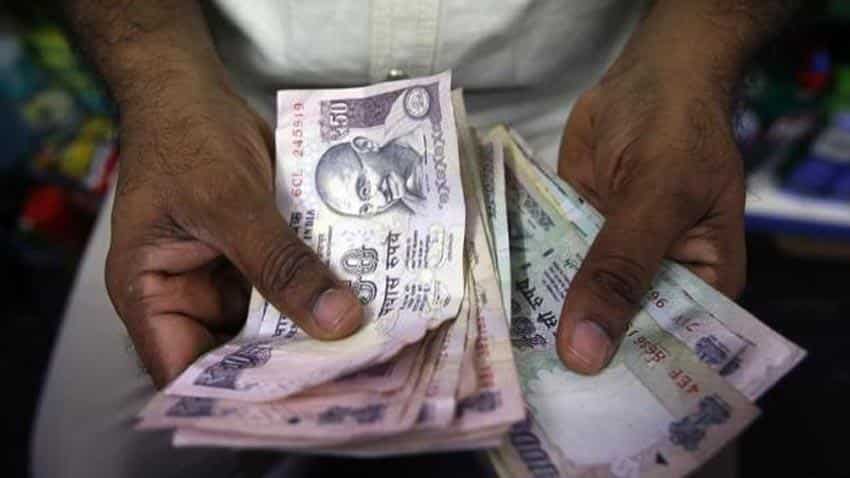 Rupee depreciates 18 paise against dollar in early trade 
