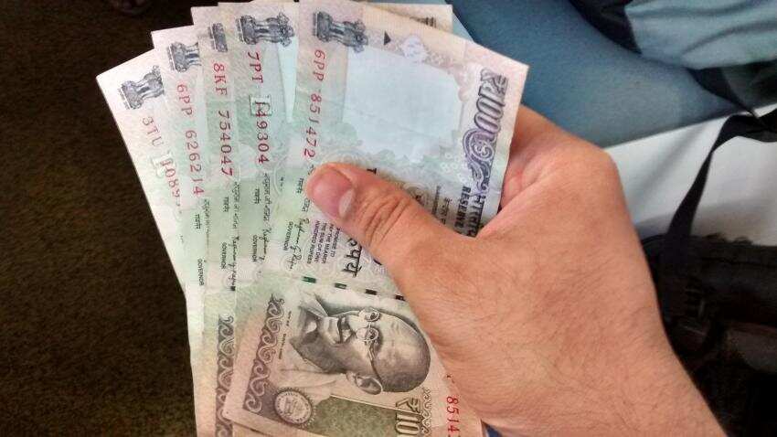 Higher opening in equity markets pushes rupee up 13 paise against dollar