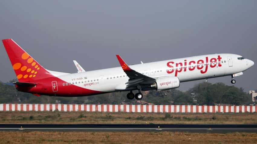 SpiceJet's landing gear gets overheated at Amritsar airport, passengers deplaned safely SpiceJet's landing gear gets overheated at Amritsar airport, passengers deplaned safely
