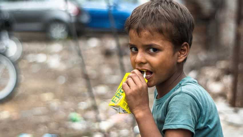 People living in extreme poverty globally falls below half the 1990-level | Zee Business People living in extreme poverty globally falls below half the 1990-level | Zee Business
