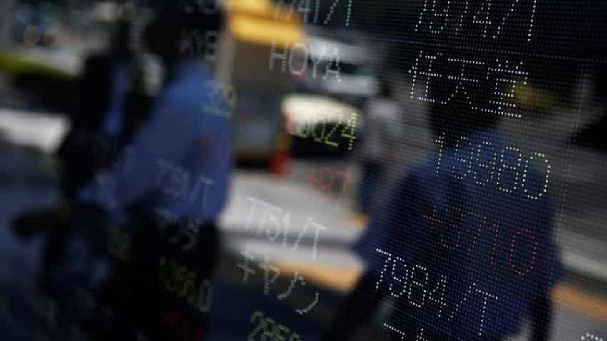 Asian shares touch 8-month high on possible BoE rate cuts