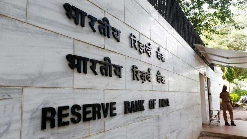 RBI soaking foreign inflows to curb impact on rupee, Rajan says