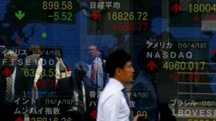 Asian stocks step back from one-year after US Fed rate talks 