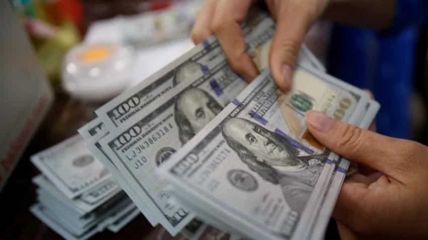 Dollar edges up, as investors wait on US Fed, Jackson Hole