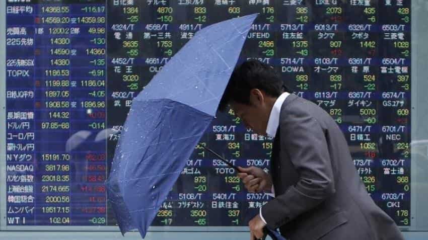 Asian shares bounce, dollar dips on Fed rate hike doubts