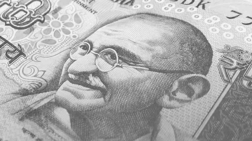 Rupee falls 10 paise against dollar on weak GDP data Rupee falls 10 paise against dollar on weak GDP data