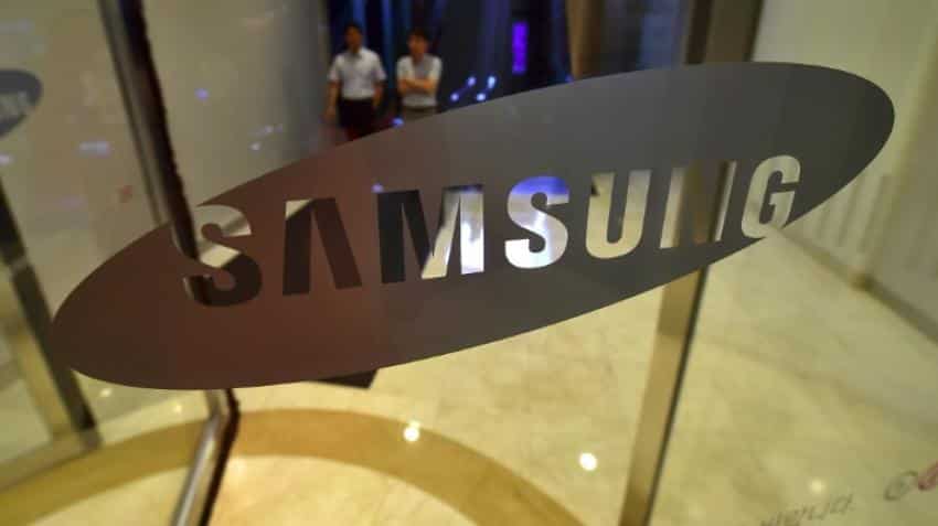 Samsung shares rise after selling printing unit Samsung shares rise after selling printing unit