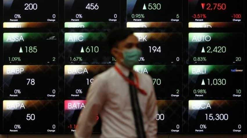 Asian stocks up as weak US data crimp Fed hike chances