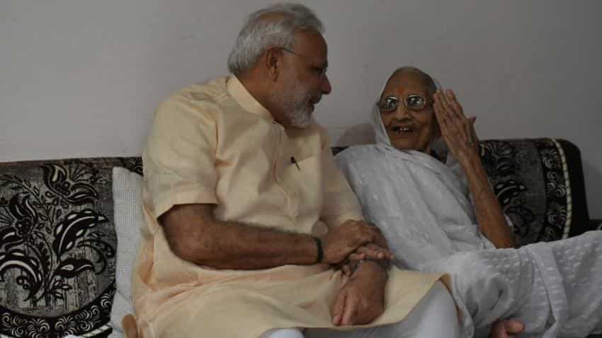 PM Modi returns home to Gujarat to celebrate 66th birthday with his mother PM Modi returns home to Gujarat to celebrate 66th birthday with his mother