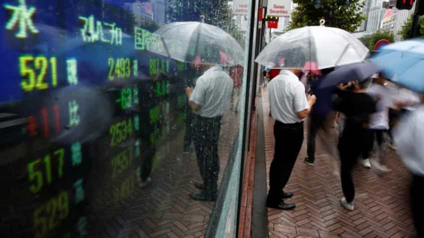 Asian stocks, gold slips on stimulus end prospects