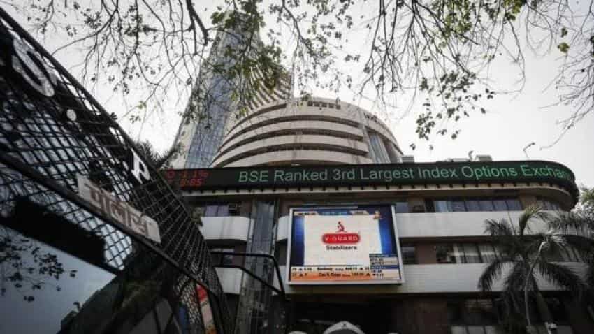 Global cues, profit booking drag equity markets lower
