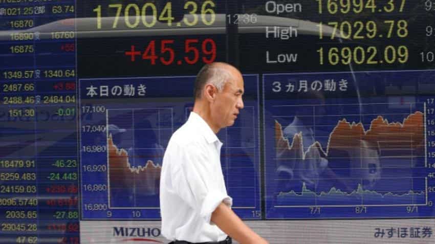Asian shares firm after U.S. service sector rebounds