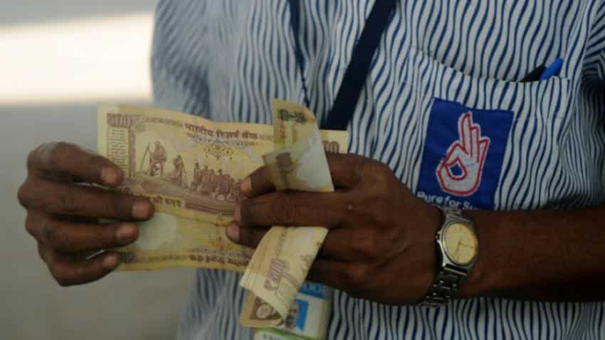 Stocks slide, ATMs run dry after India rupee shock Stocks slide, ATMs run dry after India rupee shock