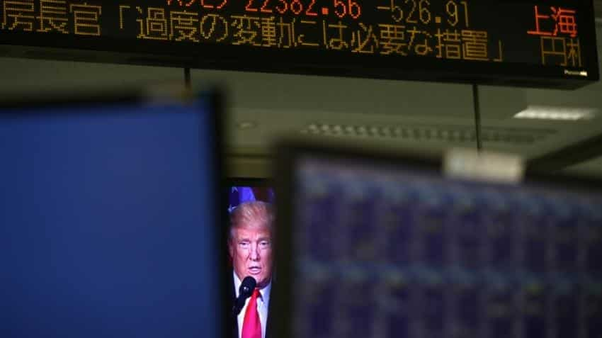 Asian markets hit by Trump fears, weak yen lifts Tokyo