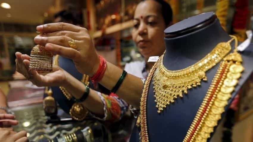 Gold rises for second day on Asia physical buying, dollar drop