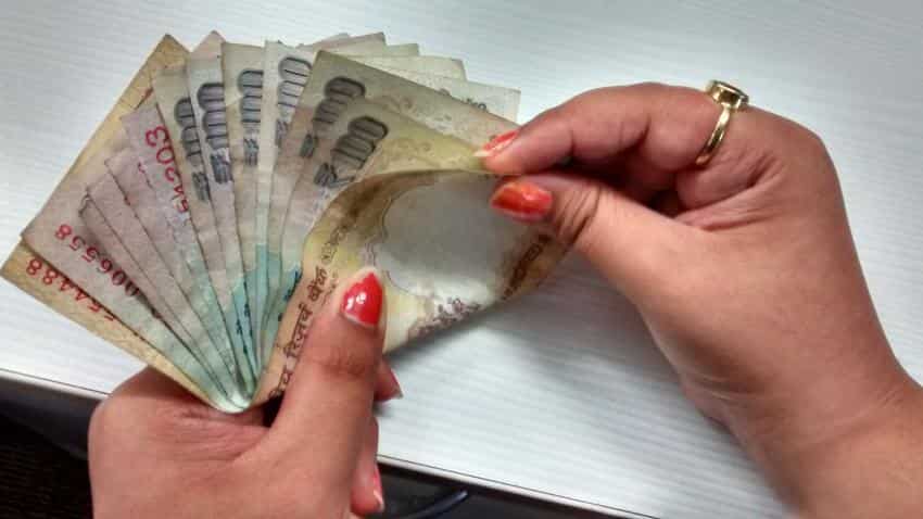Rupee gains 30 paise to 68.43 against dollar in late morning trade